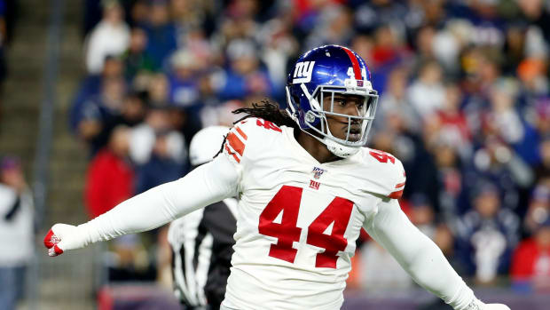 Oct 10, 2019; Foxborough, MA, USA; New York Giants linebacker Markus Golden (44) reacts after a sack on New England Patriots quarterback Tom Brady (12) during the first half at Gillette Stadium.